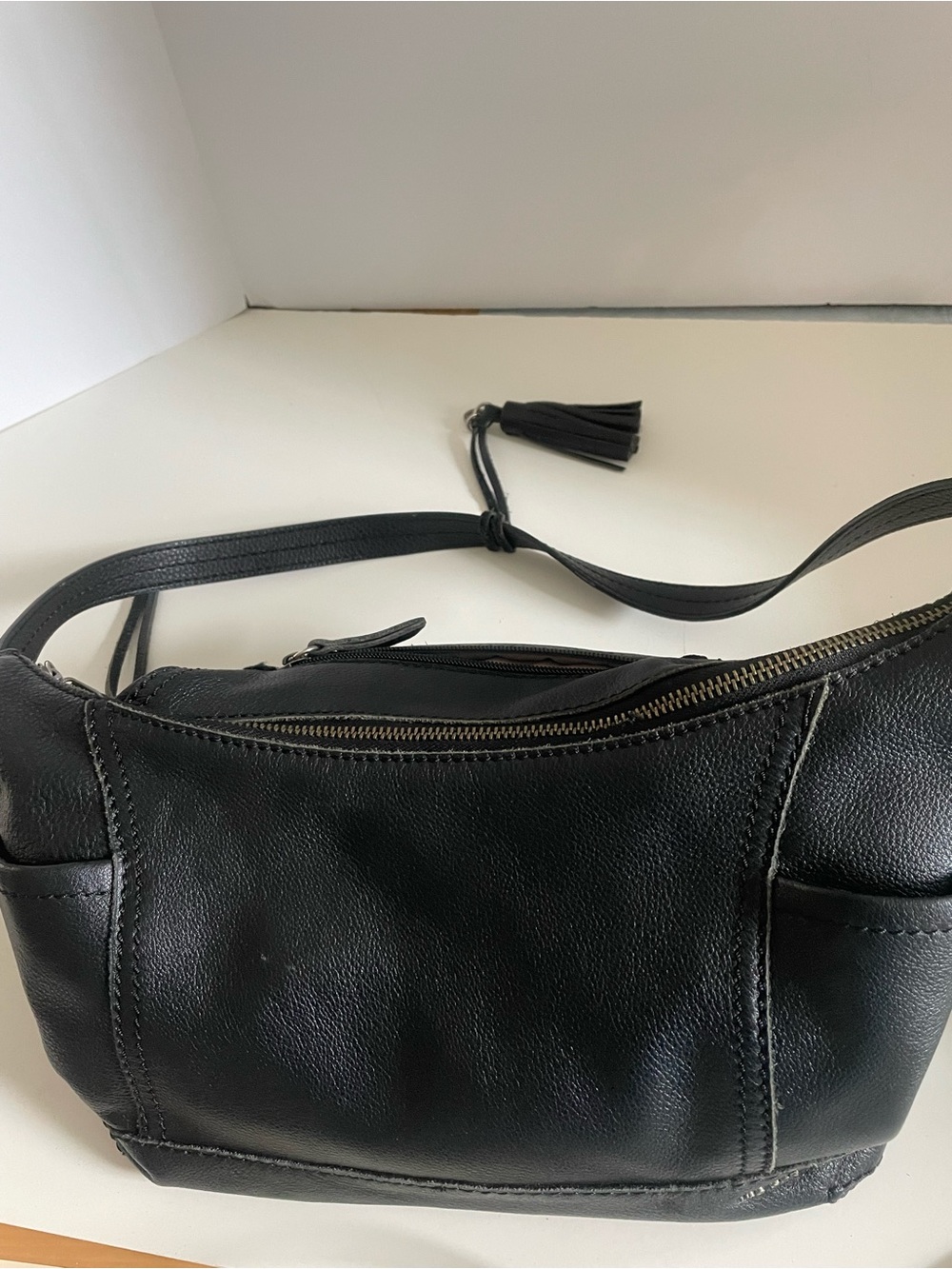 The Sak Black Leather Shoulder Bag with Tassel Detail